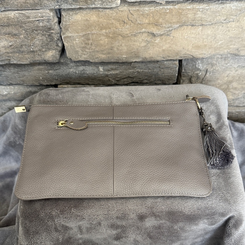 Pebbled Gray Clutch with Decorative Tassel 🐺